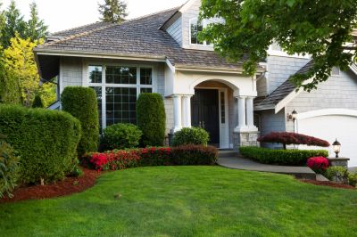Home with Landscaped Shrubs